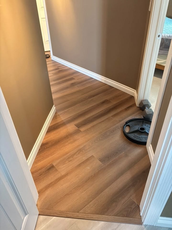 Hallway transition · walnut vinyl click