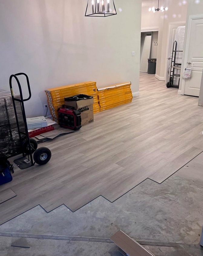 Install in progress · light oak vinyl