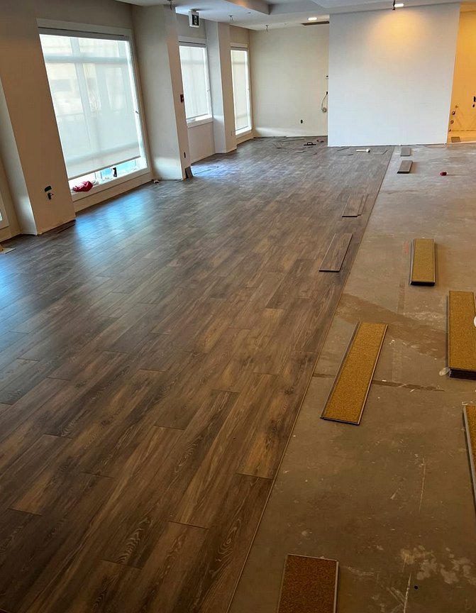 Install in progress · walnut vinyl click