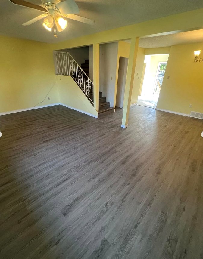 Open-concept living · grey vinyl click